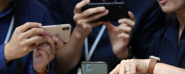 Apple, iPhone 11 modellerini tanıttı - Sputnik Türkiye