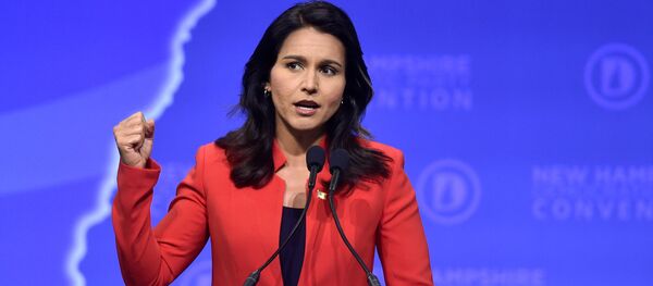 Democratic 2020 U.S. presidential candidate and U.S. Representative Tulsi Gabbard (D-HI) speaks at the New Hampshire Democratic Party state convention in Manchester, New Hampshire, U.S. September 7, 2019.      REUTERS/Gretchen Ertl - Sputnik Türkiye