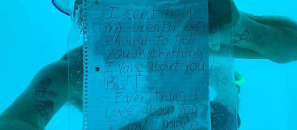 Tanzanya'da kız arkadaşına su altında evlilik teklif eden bir adam, boğularak hayatını kaybetti. - Sputnik Türkiye