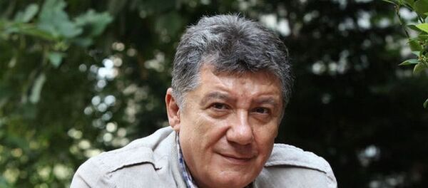 Tarık Ünlüoğlu - Sputnik Türkiye