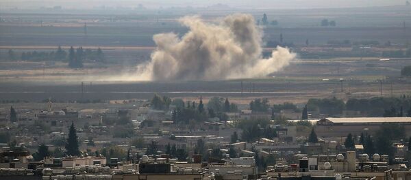 Barış Pınarı Harekatı kapsamında Ceylanpınar ilçesinin karşısında bulunan Rasulayn ateş altına alındı. - Sputnik Türkiye