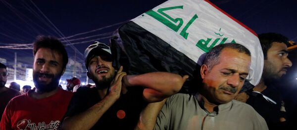 Irak'ın başkenti Bağdat ve güney kentlerde bugün yeniden başlayan hükümet karşıtı gösterilerde ölü sayısı 30'a yükseldi. - Sputnik Türkiye