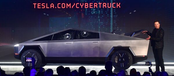 Tesla'nın ilk elektrikli pikap kamyonu ‘Cybertruck'ın tanıtımına zırhlı camların kırılması damga vurdu. Tesla'nın ilk elektrikli pikap kamyonu ‘Cybertruck'ın tanıtımına zırhlı camların kırılması damga vurdu. - Sputnik Türkiye