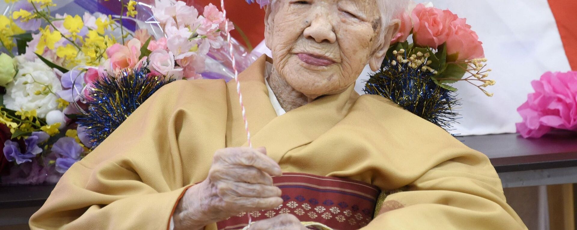 Japonya'da yaşayan Kane Tanaka, 117. doğum gününü kutlayarak sahip olduğu 'dünyanın en yaşlı insanı' rekorunu yeniledi. - Sputnik Türkiye, 1920, 15.09.2021