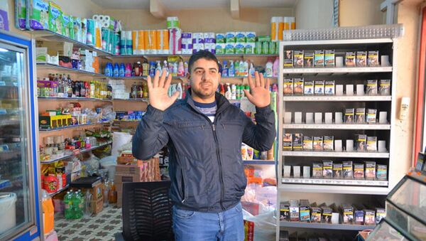 Beş kişinin gasp ettiği market sahibi Hasan Özkaya - Sputnik Türkiye