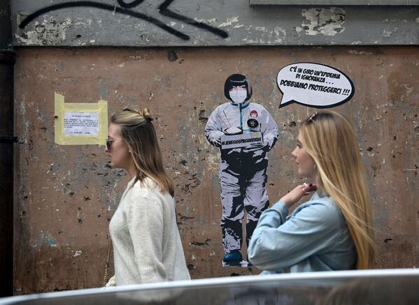 Dünyanın farklı ülkelerinde koronavirüsle mücadele konulu duvar resimleri - Sputnik Türkiye