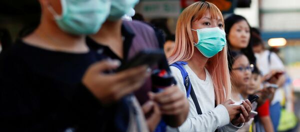 Malezya ulusal karantina ilan etmeden önce Singapur'a geçmeye çalışan yolcular Malezya ulusal karantina ilan etmeden önce Singapur'a geçmeye çalışan yolcular - Sputnik Türkiye