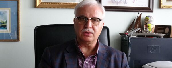 Tevfik Özlü Tevfik Özlü - Sputnik Türkiye