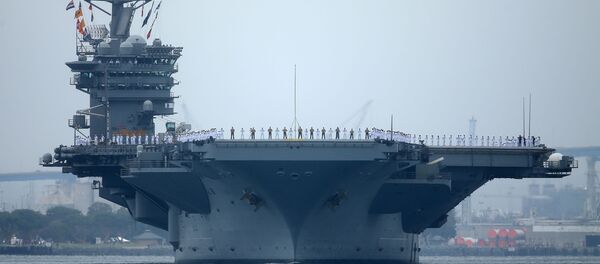 FILE PHOTO: Sailors man the rails as aircraft carrier USS Nimitz with Carrier Strike Group 11, and some 7,500 sailors and airmen depart for a 6 month deployment in the Western Pacific from San Diego, California, U.S., June 5, 2017. REUTERS/Mike Blake/File Photo - Sputnik Türkiye